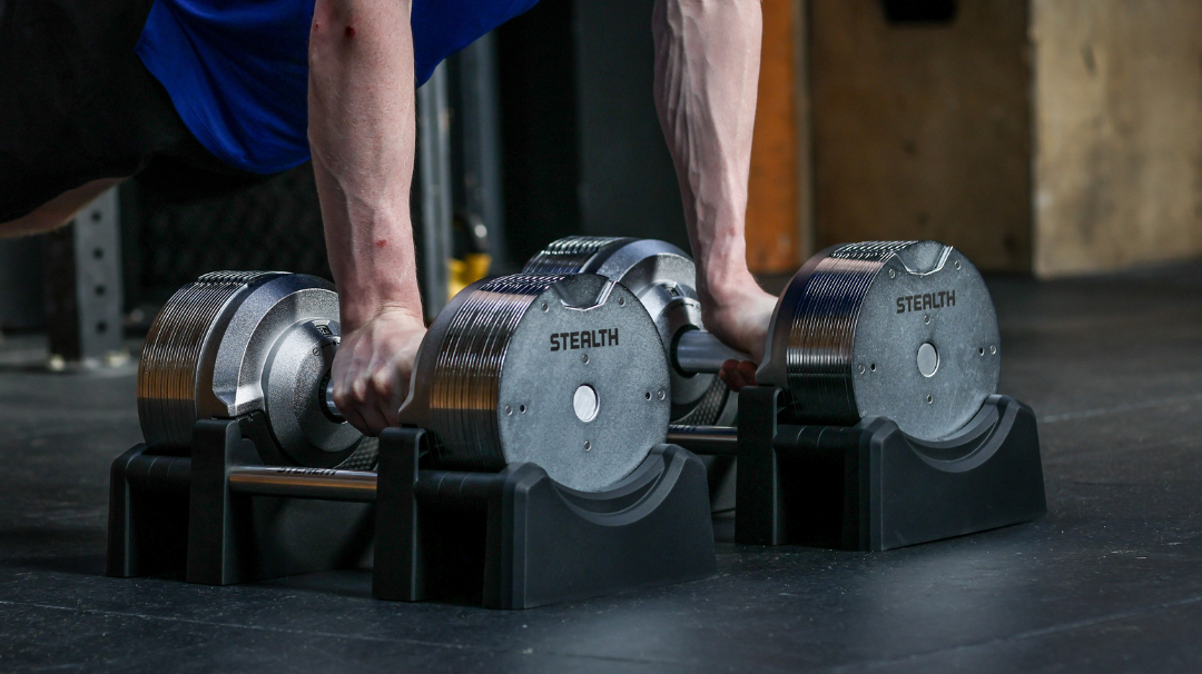 Rubber gym flooring tiles under Stealth Adjustable Dumbbells