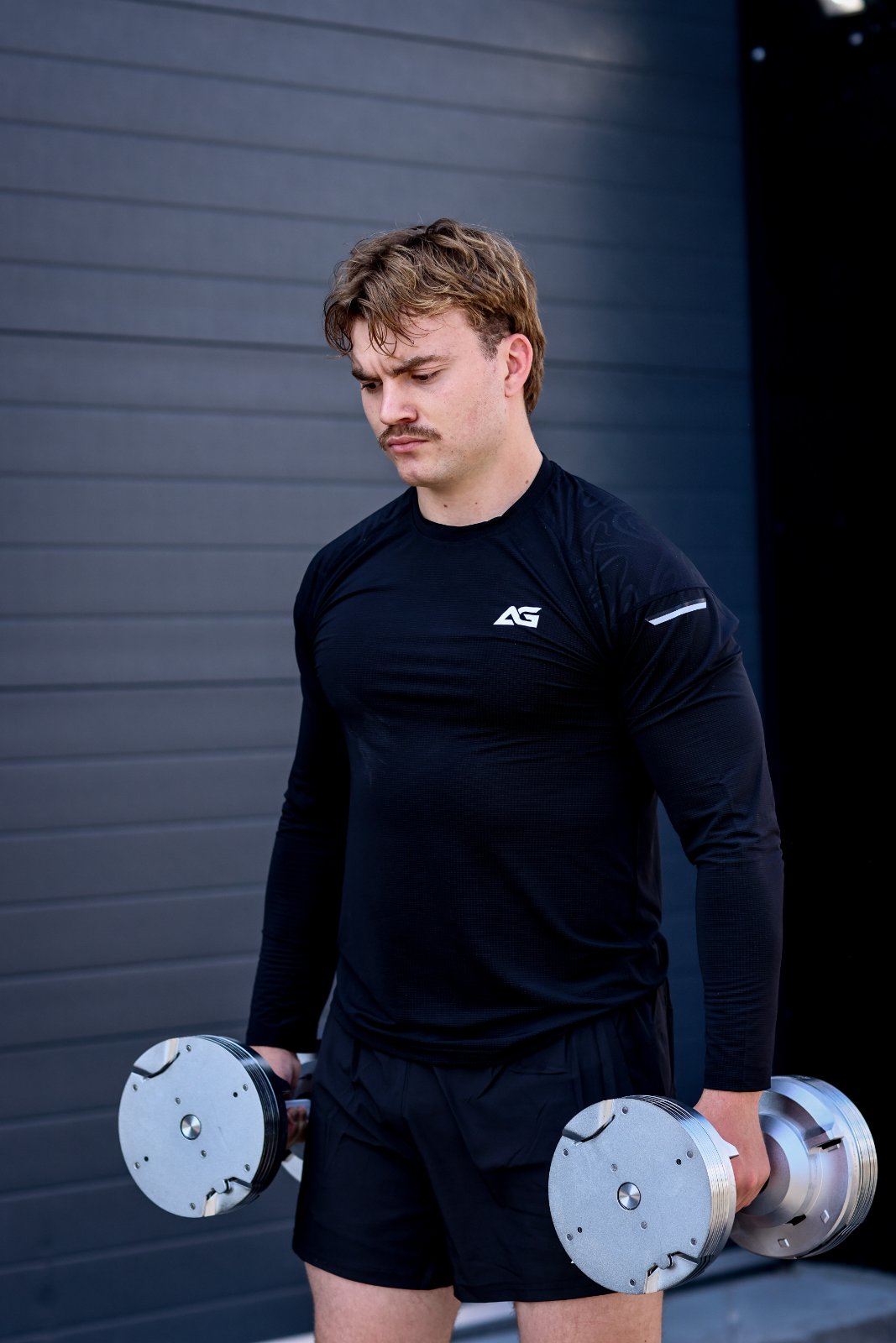 Samuel, the author using Stealth Crome Edition adjustable dumbbell