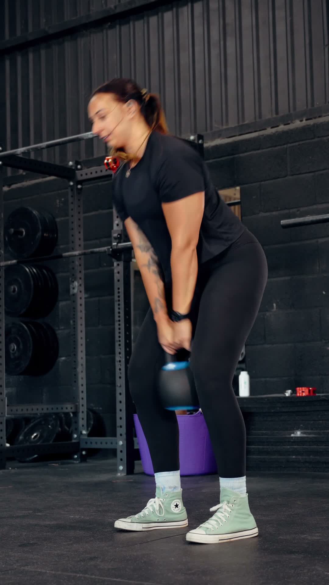 Athlete swinging the Stealth kettlebell to full extension